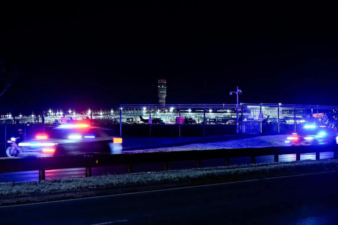 A view shows Reagan Washington National Airport, as seen from Arlington, after American Eagle flight 5342 collided with a helicopter while approaching Reagan Washington National Airport and crashed in the Potomac River, Virginia, U.S. January 29, 2025. REUTERS/Elizabeth Frantz