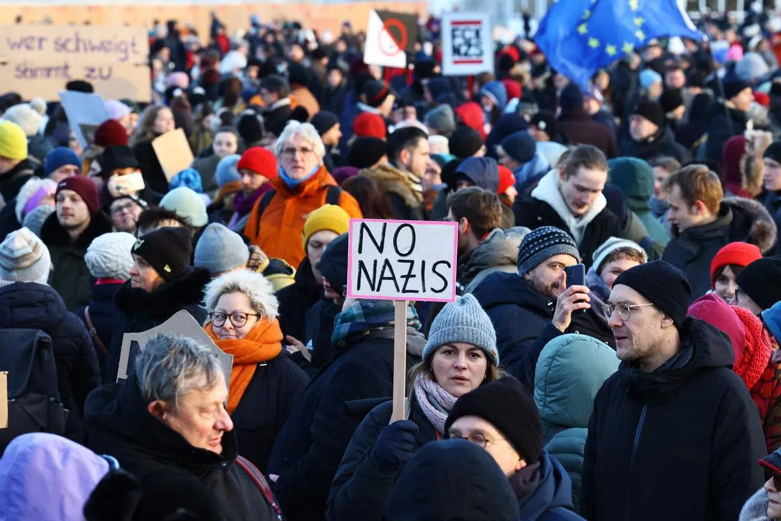 Tens of thousands of people turned out in cities across Germany, including Berlin (above), to protest against racism and far-right politics.