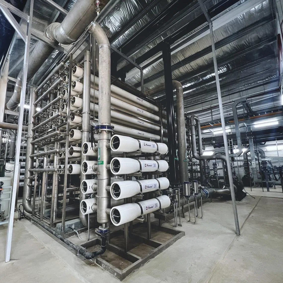 Treated sewage effluent goes through three passes of cylinders containing reverse osmosis membranes before they are channelled to a storage tank.