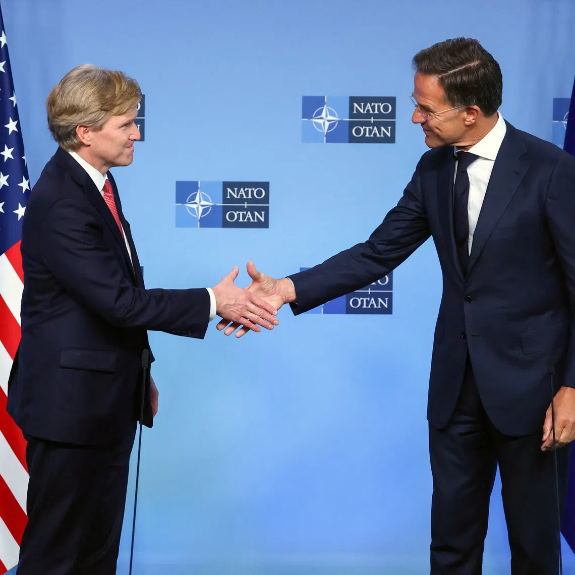 Pentagon policy chief Elbridge Colby shakes hands with NATO Secretary General Mark Rutte, at the Alliance's headquarters in Brussels, Belgium, August 27, 2026. REUTERS/Yves Herman
