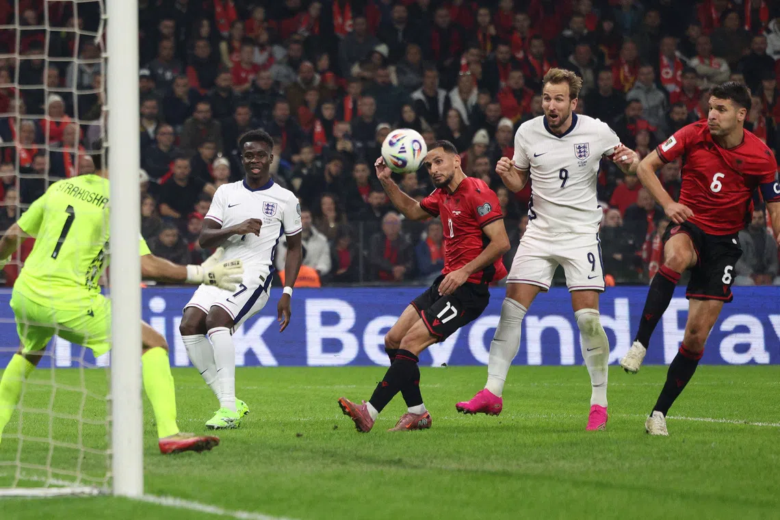 Soccer Football - World Cup - UEFA Qualifiers - Group K - Albania v England - Air Albania Stadium, Tirana, Albania - November 16, 2025 England's Harry Kane scores their second goal REUTERS/Florion Goga