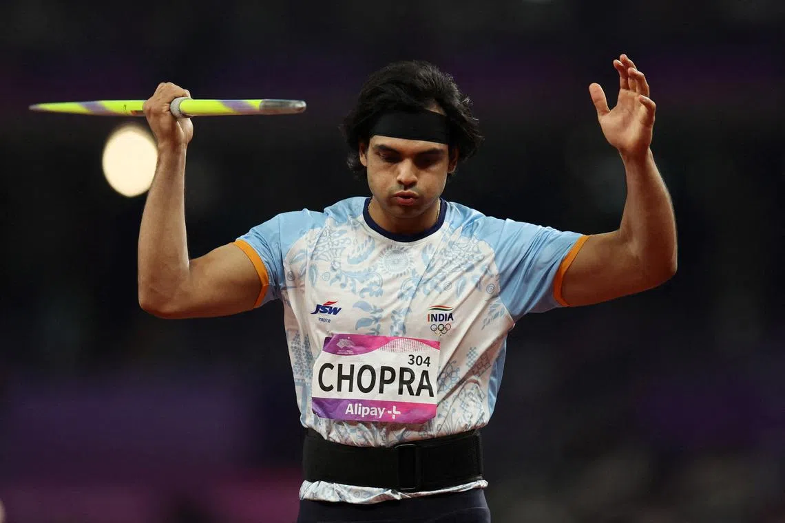 FILE PHOTO: Asian Games - Hangzhou 2022 - Athletics - Olympic Sports Centre, Hangzhou, China - October 4, 2023 India's Neeraj Chopra in action during the men's Javelin final REUTERS/Jeremy Lee/File Photo