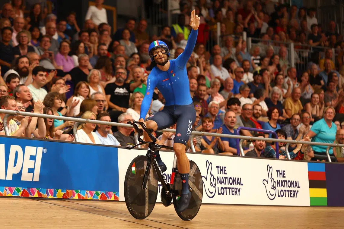 Italy's Filippo Ganna celebrating after winning the men's elite individual pursuit final at the UCI World Championships 