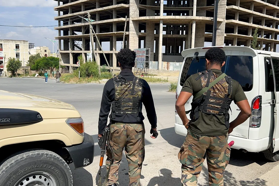 Members of the Ethiopian pro-government Tigray Peace Force (TPF) patrol after the Tigray People's Liberation Front (TPLF) army retreated from the regional capital Mekelle, Tigray Region, Ethiopia, October 6, 2026. Picture taken with a mobile phone. Obtained by REUTERS