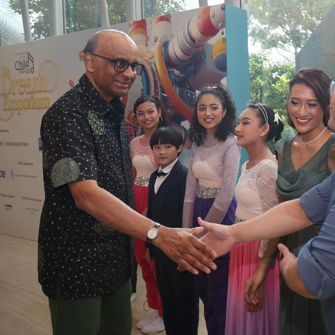 President Tharman Shanmugaratnam (left) at the ChildAid 2024: The Dream Emporium performance at the Esplanade on Nov 30.