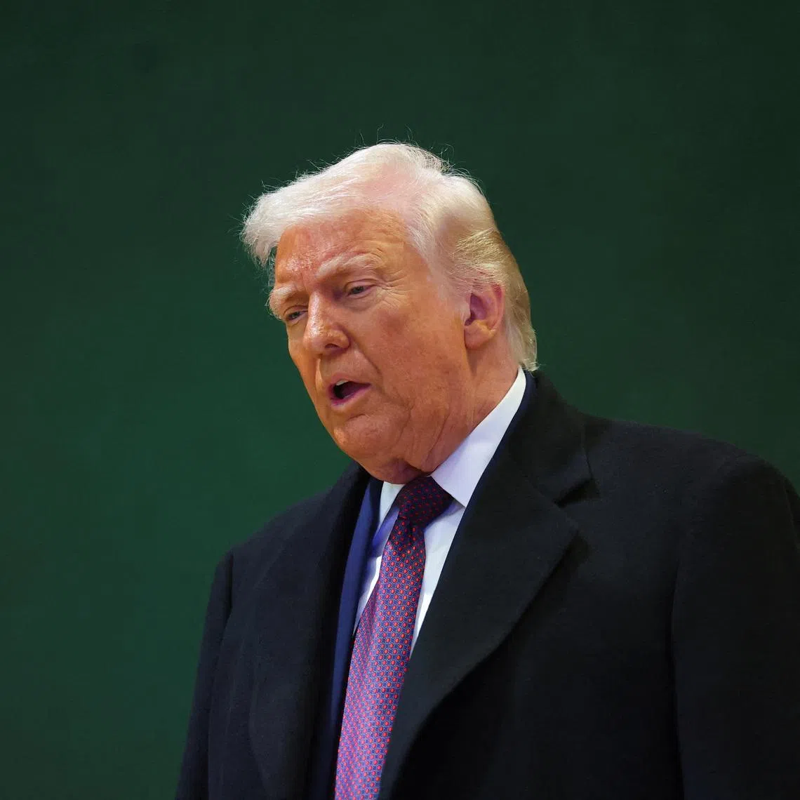 U.S. President Donald Trump speaks to the media during the 56th annual World Economic Forum (WEF) meeting in Davos, Switzerland, January 22, 2026. REUTERS/Denis Balibouse/File Photo