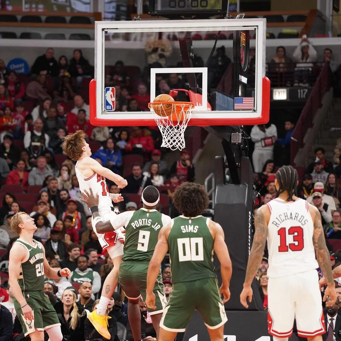 Chicago Bulls forward Matas Buzelis dunks the ball against the Milwaukee Bucks during the second half at United Center.