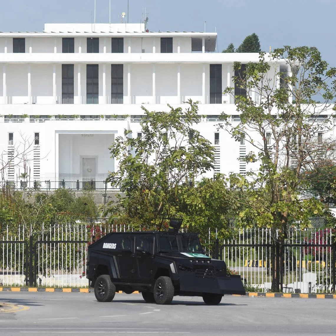 A security vehicle moves past the President house as Pakistan gears up to host the U.S. and Iran for peace talks, in Islamabad, Pakistan, April 9, 2026. REUTERS/Waseem Khan