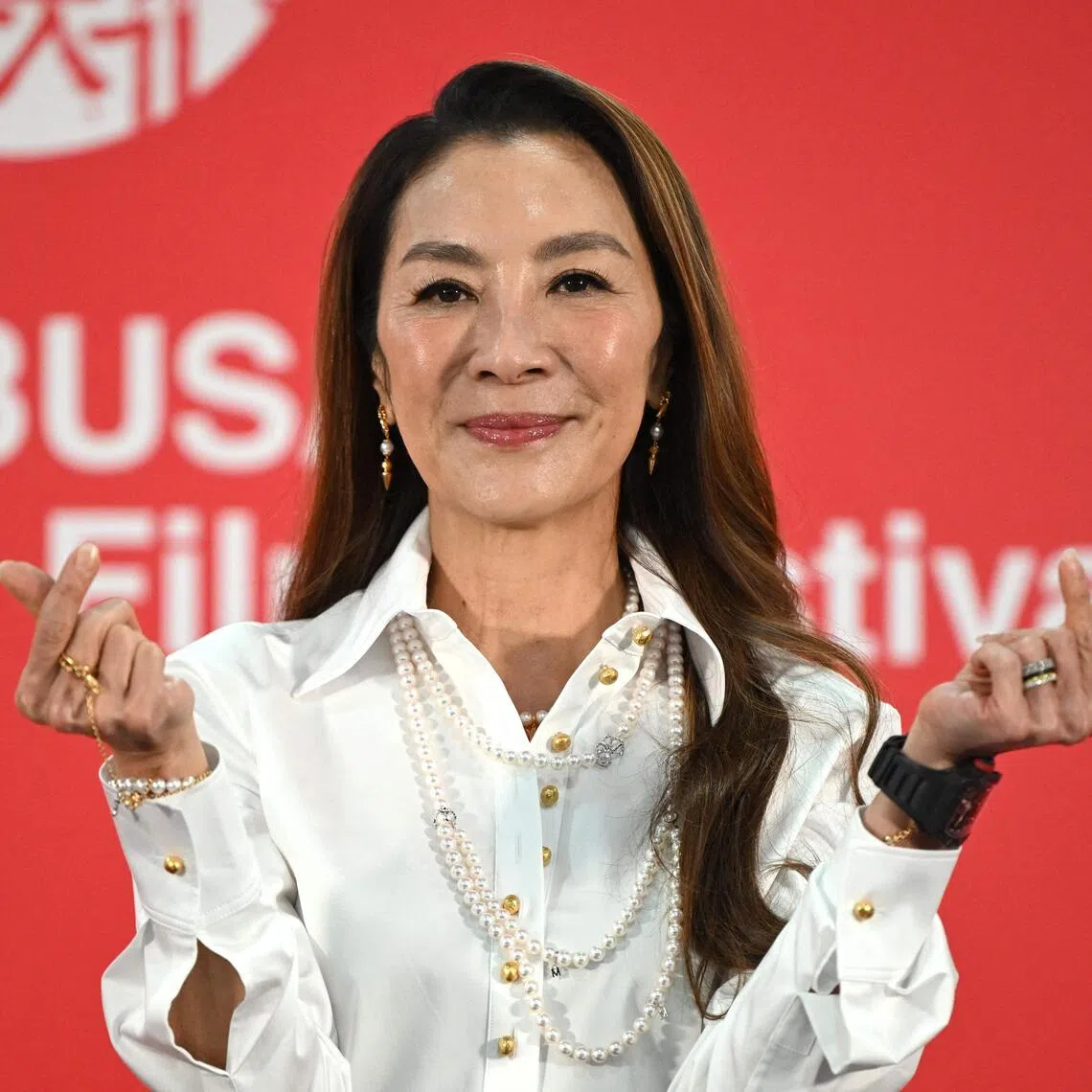Actress Michelle Yeoh poses for a photo during a press conference for her film It’s My Time at the 31st Busan International Film Festival on Oct 7.