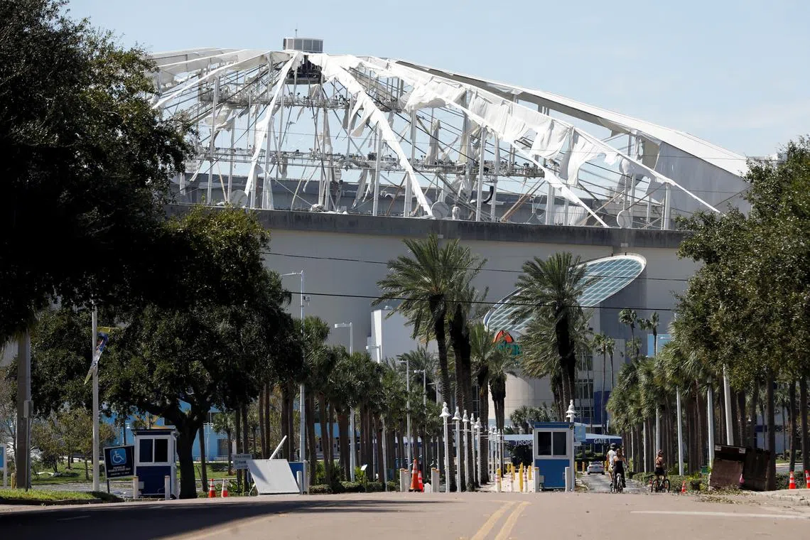 FILE PHOTO: View of the damaged roof of Tropicana Field stadium, the home of Major League Baseball's Tampa Bay Rays, after Hurricane Milton made landfall, in St. Petersburg, Florida, U.S. October 10, 2024.  REUTERS/Octavio Jones/File Photo