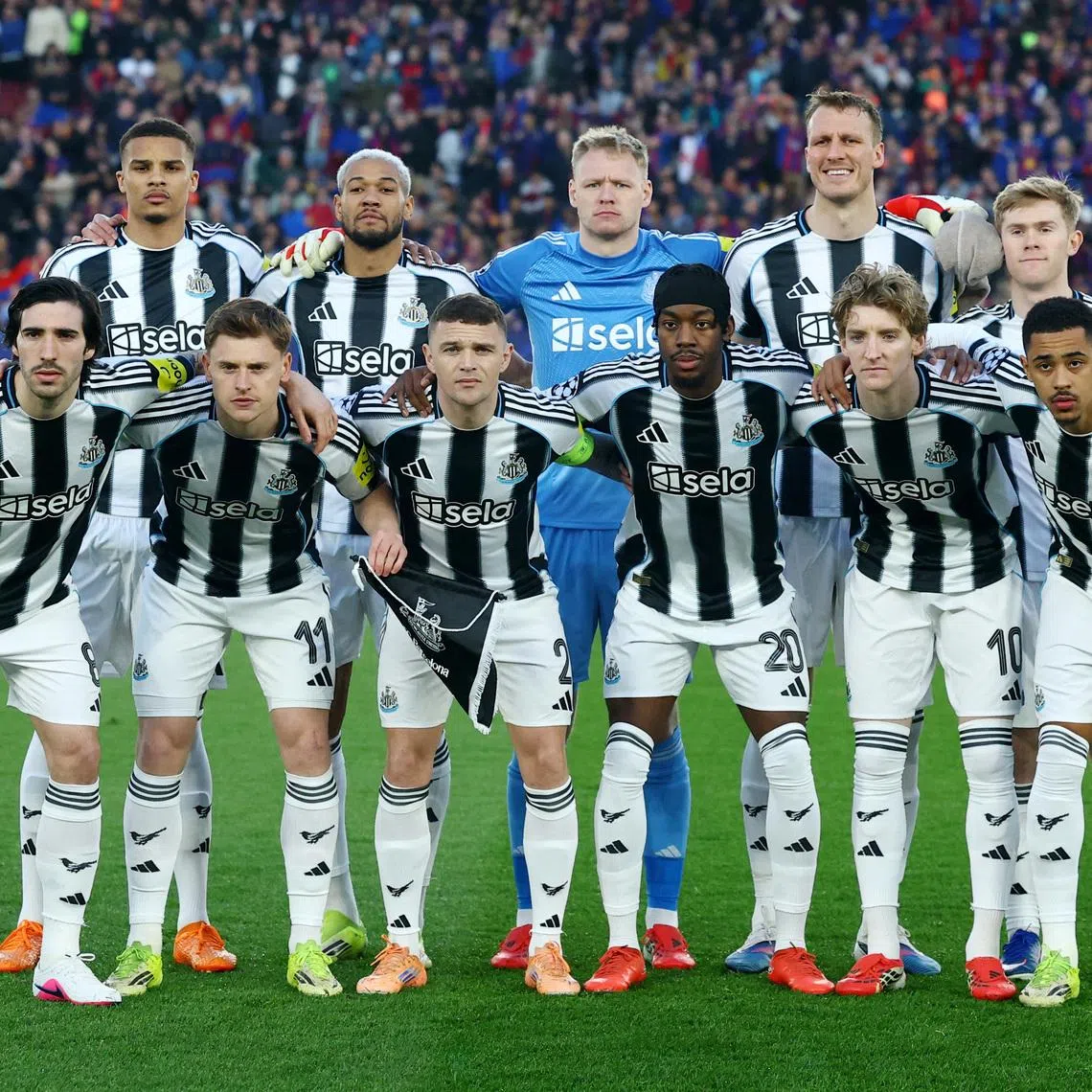 Soccer Football - UEFA Champions League - Round of 16 - Second Leg - FC Barcelona v Newcastle United - Spotify Camp Nou, Barcelona, Spain - March 18, 2026 Newcastle United players pose for a team group photo before the match REUTERS/Albert Gea
