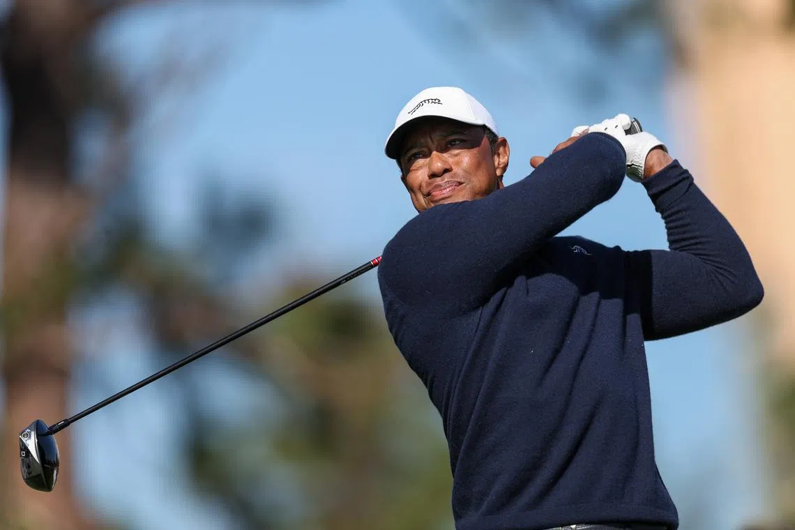 Dec 21, 2024; Orlando, Florida, [USA]; Tiger Woods tees off on the fifth hole during the PNC Championship at The Ritz-Carlton Golf Club. Mandatory Credit: Nathan Ray Seebeck-Imagn Images/ File Photo