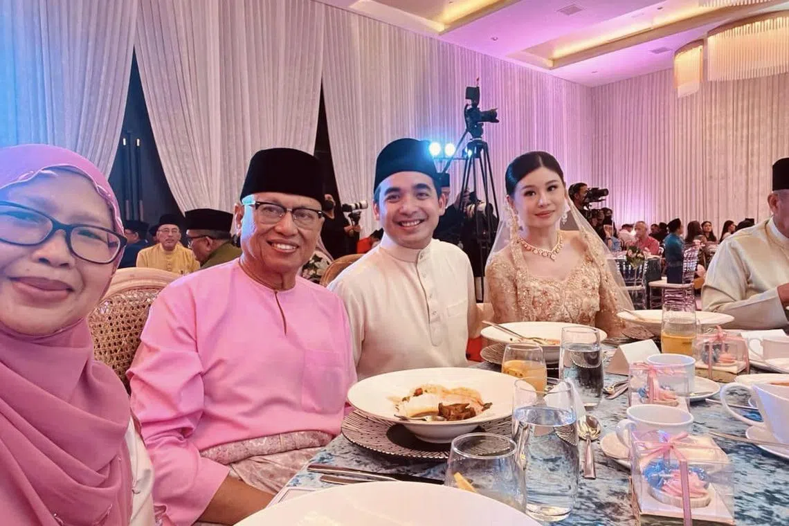 Umno supreme council member Datuk Mohd Puad Zarkashi (second from left) with Mr Najib Razak's youngest son Mohd Norashman and his fiancee Nikola Mulyadi.