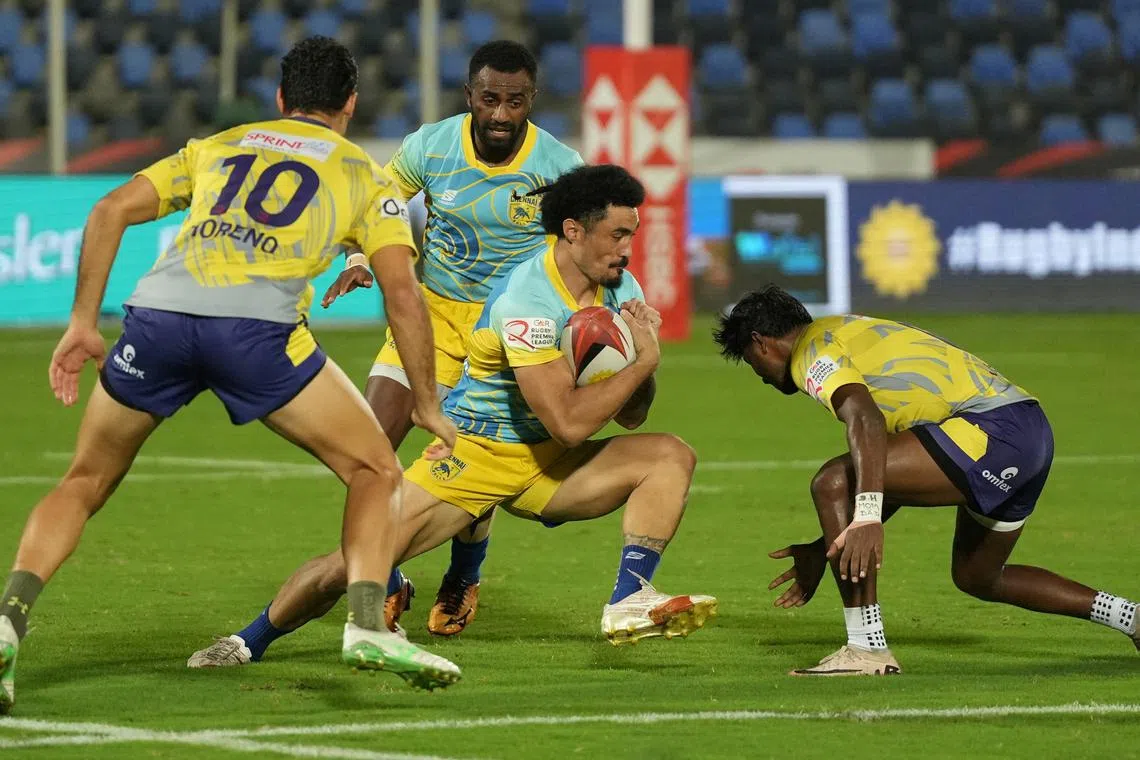 Chennai Bulls’ Vaafauese Apelu Maliko and Hyderabad Blues’ Manuel Moreno in action during their match at the Rugby Premier League in Mumbai, India, June 24, 2025. REUTERS/ Hemanshi Kamani