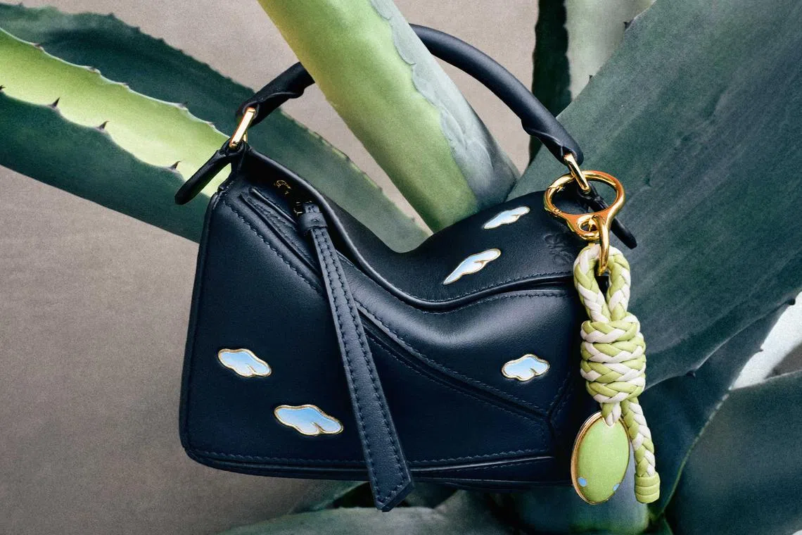 acsnake16 - Loewe Mini Puzzle Bag in Nappa Calfskin ($3,990) & Snake Knot Charm in Classic Calfskin ($950)

Credit: LOEWE