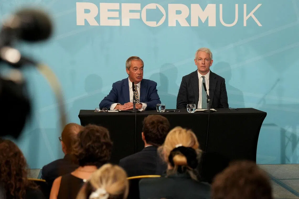 Reform UK Leader Nigel Farage speaks alongside Newly appointed Reform UK MP Danny Kruger (right) during a press conference, in London on Sept 15, 2025.