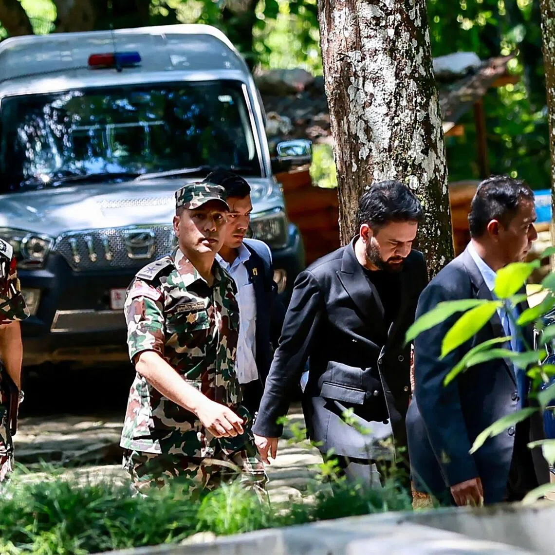 Nepal’s Prime Minister Balendra Shah (second from right) arriving to inspect the area following flash floods at Bidur municipality.