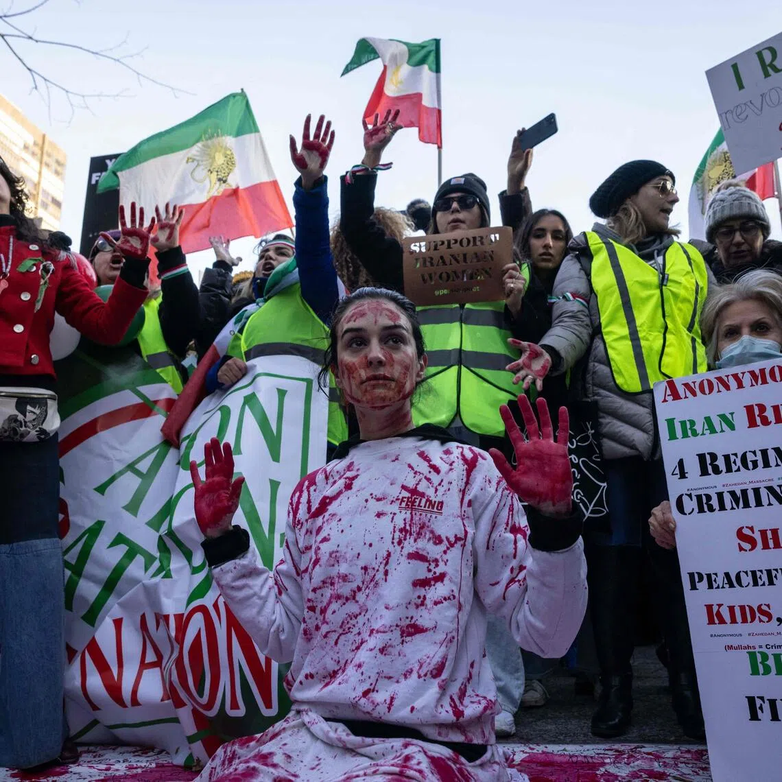 Protesters call on the UN to take action against the treatment of women in Iran on Nov 19, 2022, following the death of Ms Mahsa Amini.