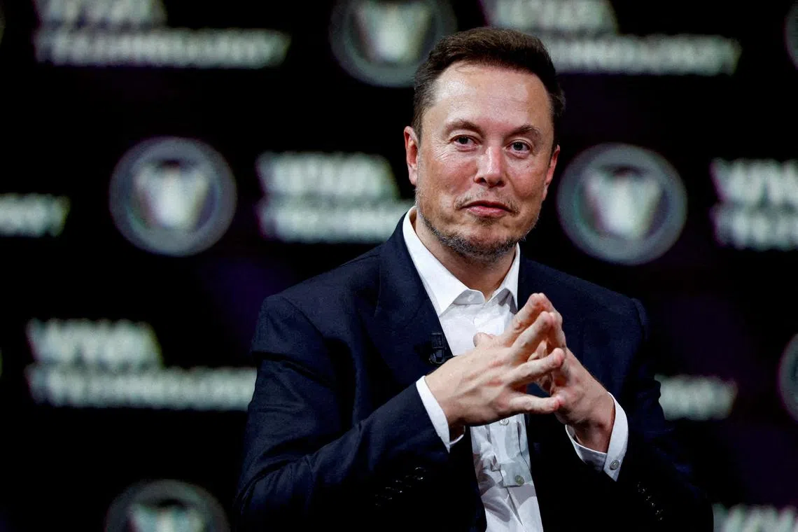 FILE PHOTO: Chief Executive Officer of SpaceX and Tesla and owner of Twitter, gestures as he attends the Viva Technology conference dedicated to innovation and startups at the Porte de Versailles exhibition centre in Paris, France, June 16, 2023. REUTERS/Gonzalo Fuentes//File Photo