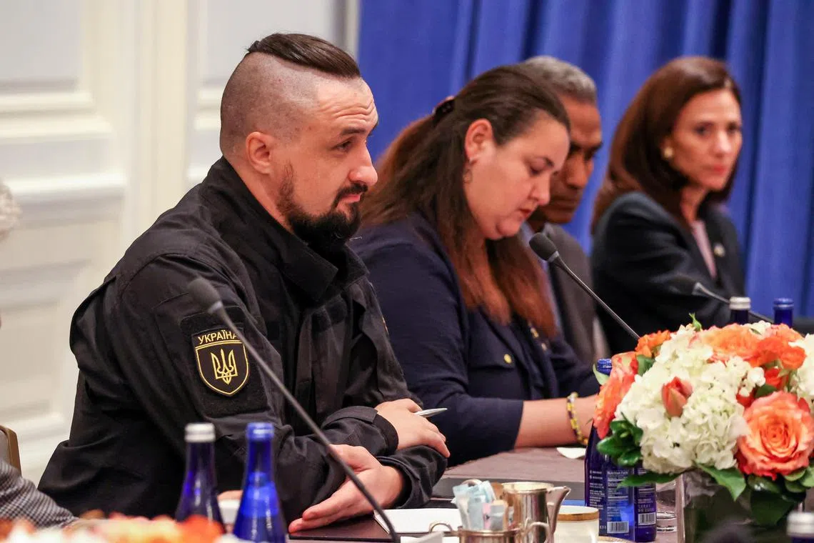 Mr Oleksandr Kamyshin, minister of strategic industries in Ukraine, listens during a meeting with US Secretary of State Antony Blinken (not pictured), in September 2023.