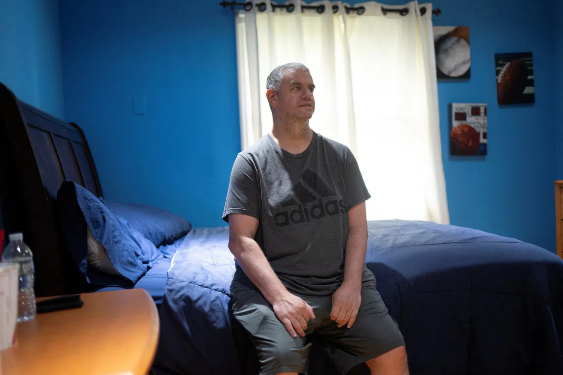 Richie Rosen, a resident of a facility that houses people with developmental disabilities, where three Haitian caregivers who held Temporary Protected Status (TPS) worked until the Supreme Court decision ended TPS for Haitians, poses for a portrait in New City, New York, U.S., August 11, 2026.  REUTERS/Vincent Alban