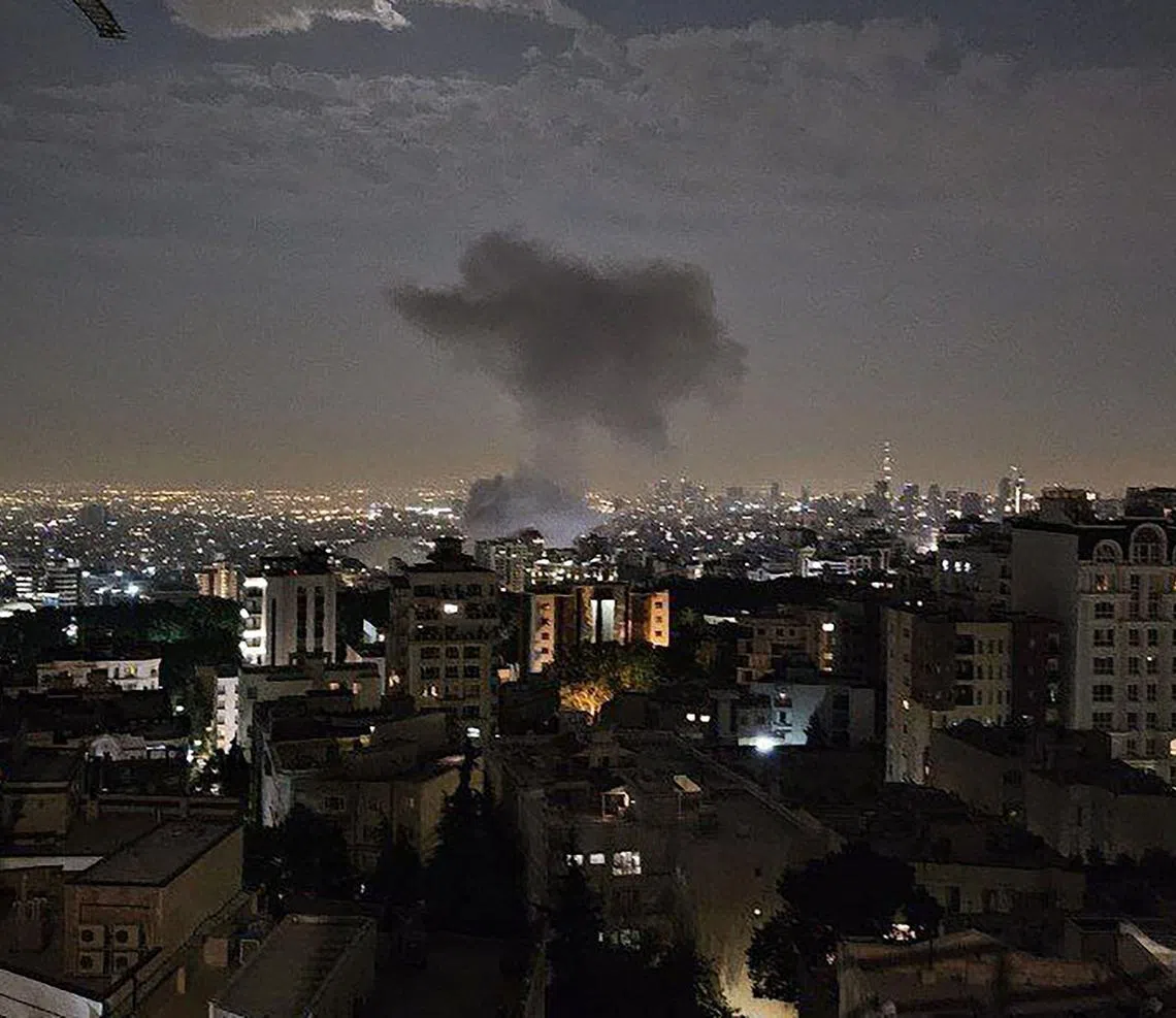 This handout photo released by Iran's Revolutionary Guard Corps (IRGC) official Sepah News Telegram channel on June 13, 2025 reportedly shows smoke billowing from a site targeted by an Israeli strike in the Iranian capital Tehran early in the morning. Israeli Prime Minister Benjamin Netanyahu said in a video statement in the early hours of June 13 that Israel carried out strikes on Iran and the military operation against the Islamic republic would  "continue for as many days as it takes". (Photo by SEPAH NEWS / AFP) / RESTRICTED TO EDITORIAL USE - MANDATORY CREDIT "AFP PHOTO / SEPAH NEWS  " - NO MARKETING NO ADVERTISING CAMPAIGNS - DISTRIBUTED AS A SERVICE TO CLIENTS