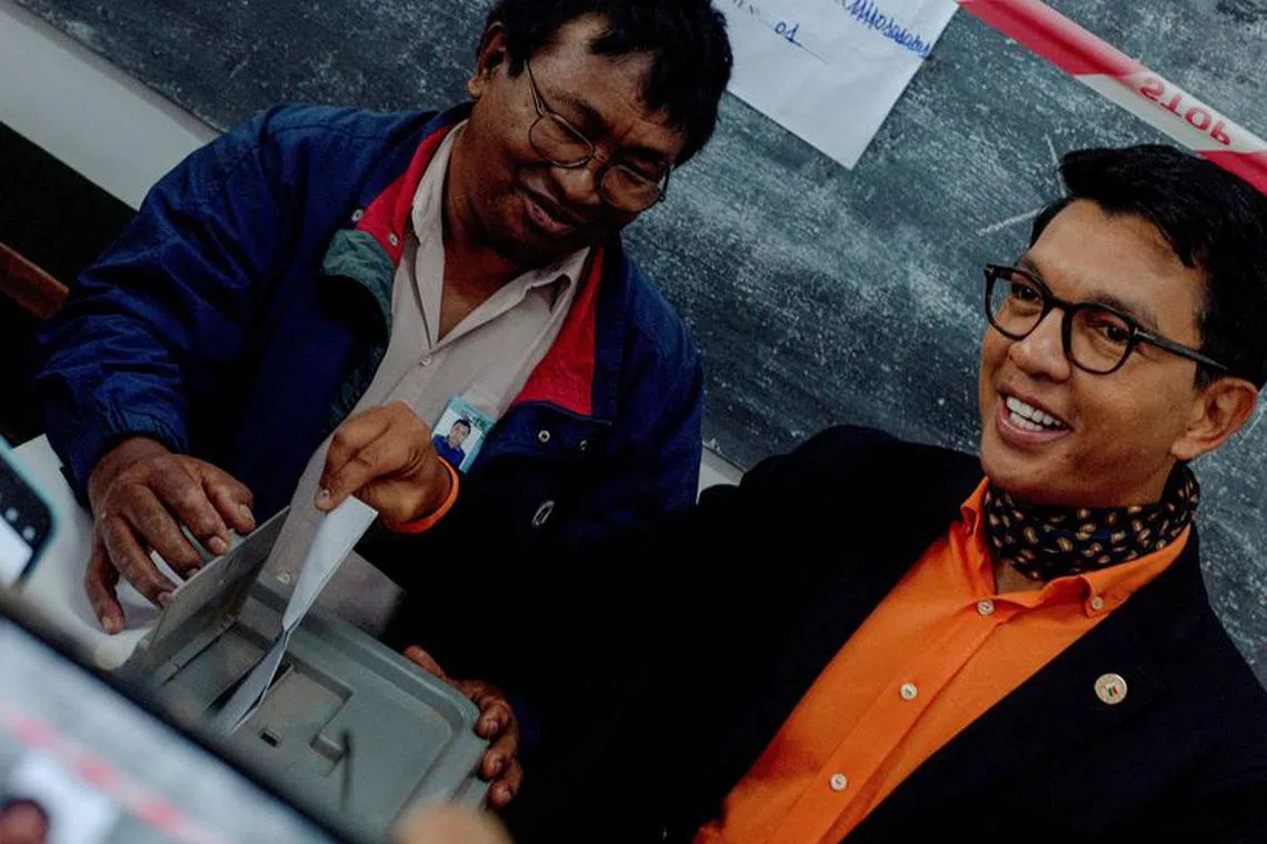 FILE PHOTO: Madagascar's President and a presidential candidate Andry Rajoelina casts his ballot at a polling station during the presidential election in Ambatobe, Antananarivo, Madagascar November 16, 2023. REUTERS/Zo Andrianjafy