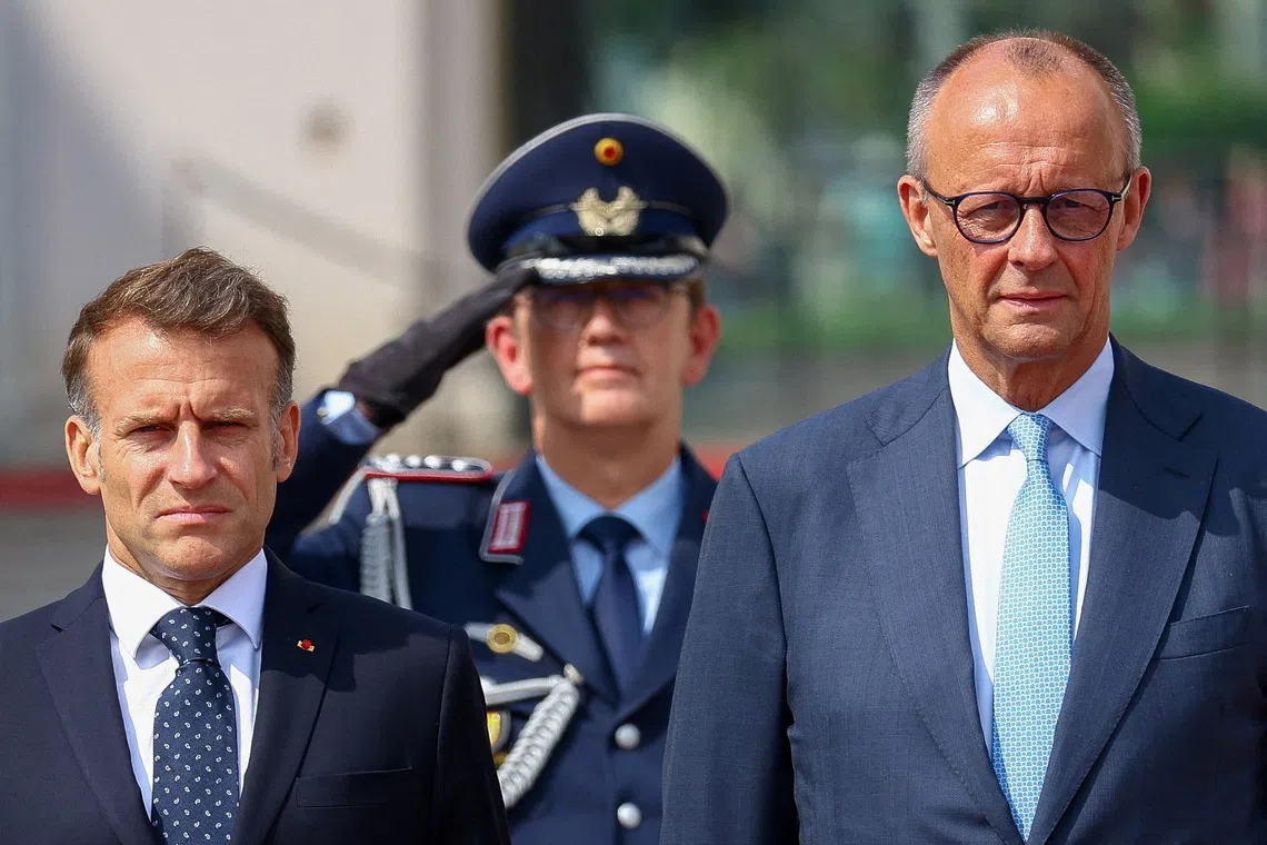 German Chancellor Friedrich Merz welcomes French President Emmanuel Macron with military honours at Schloss Augustusburg in Bruehl, Germany, July 17, 2026. REUTERS/Thilo Schmuelgen
