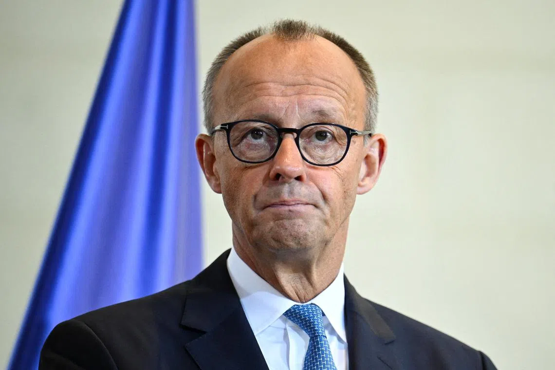 German Chancellor Friedrich Merz looks on during a press conference with Canadian Prime Minister Mark Carney (not pictured) at the Chancellery in Berlin, Germany August 26, 2025. REUTERS/Annegret Hilse
