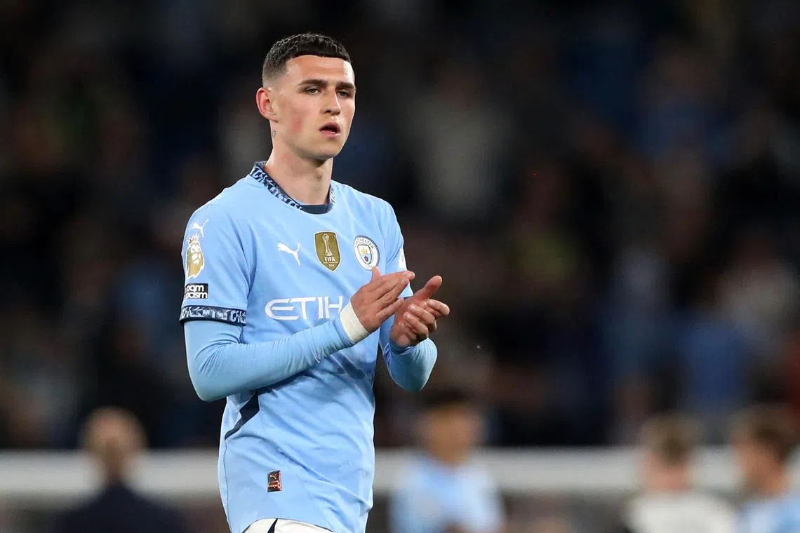 FILE PHOTO: Soccer Football - Premier League - Manchester City v Wolverhampton Wanderers - Etihad Stadium, Manchester, Britain - May 2, 2025 Manchester City's Phil Foden celebrates after the match. REUTERS/Scott Heppell/File Photo