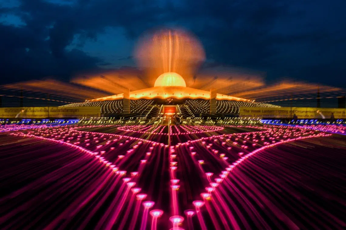 A view of Wat Phra Dhammakaya temple during a ceremony commemorating Vesak Day, an annual celebration of Buddha's birth, enlightenment and death, in Pathum Thani province outside Bangkok, Thailand, on June 3, 2023. 