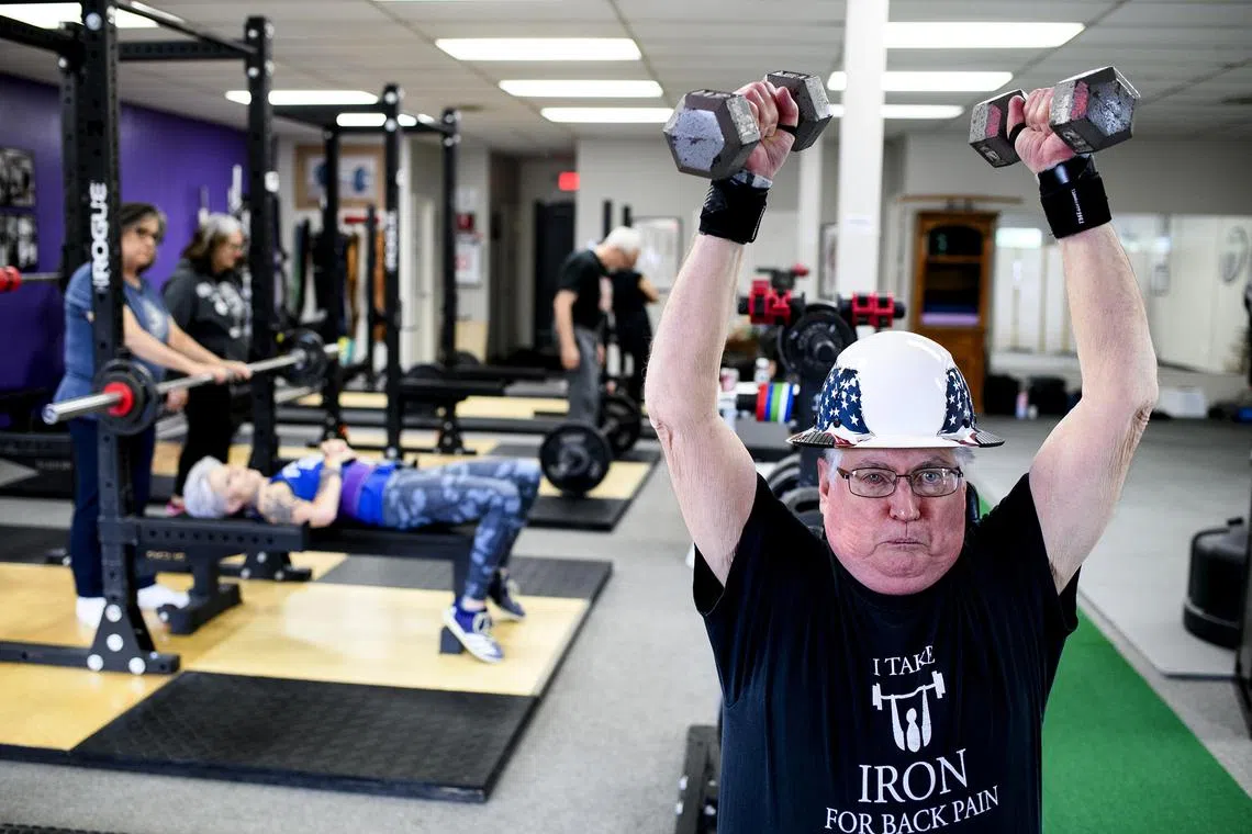 Mr John Rosengren, 76, builds back after a spinal surgery at Greysteel Strength and Conditioning gym, in Michigan on June 20.