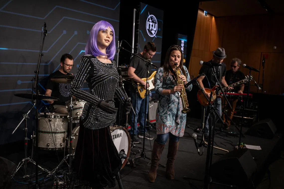 AI robot frontwoman "Desdemona" performs during the world's largest gathering of humanoid AI Robots in Geneva.