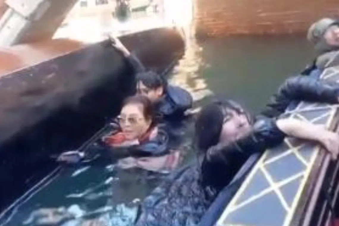 The boat was overturned when the gondolier, who instructed his passengers to remain seated, was trying to navigate a low bridge.
