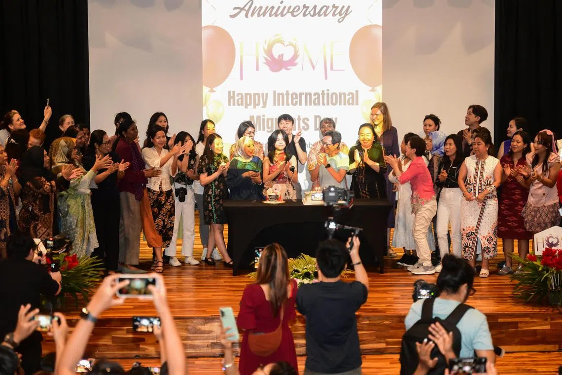 ST20241208_202432200128 slmigrant08 Azmi Athni/Samuel Devaraj//

Dr Ng Kok Hoe (center, in blue), president of Humanitarian Organisation for Migration Economics (HOME), with HOME members celebrating their 20th anniversary celebration in conjunction with International Migrants Day on Dec 8.

ST PHOTO: AZMI ATHNI