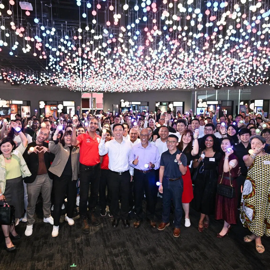 ST20251209-202562700282-Lim Yaohui-Theresa Tan-thmsf09/
Minister for Social and Family Development, Mr Masagos Zulkifli; and Minister of State for Social and Family Development, Mr Goh Pei Ming; taking a group photograph with the event guests during the closing event of the Year of Celebrating Social Service Professionals at Flower Field Hall in Gardens by the Bay on Dec 9, 2025.
Minister for Social and Family Development, Mr Masagos Zulkifli, will announce enhancements to capability building initiatives under the Professional Capability Grant. Minister of State for Social and Family Development, Mr Goh Pei Ming, will also be in attendance.
(ST PHOTO: LIM YAOHUI)