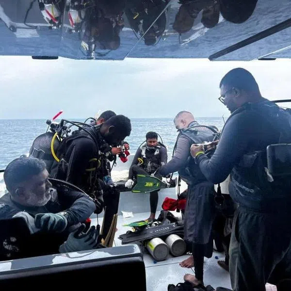 Members of Maldives' Defence Force preparing to take part in a search and recovery operation for the missing Italian scuba divers in the waters of Vaavu Atoll, Maldives, on May 16.