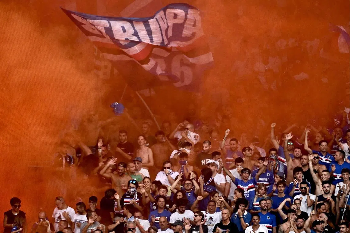 Sampdoria fans at the Luigi Ferraris Stadium in Genoa during the 2022-23 season, when they were relegated from Serie A. They have narrowly avoided dropping into Italy's third tier for the first time.