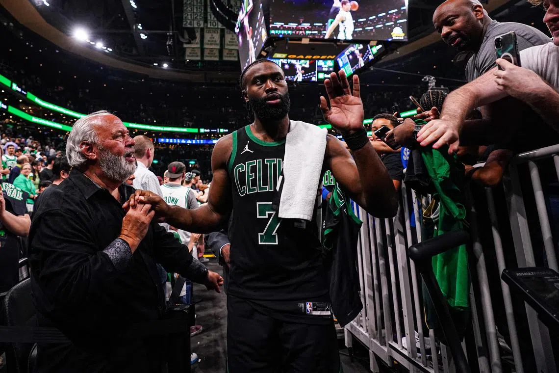 Boston Celtics guard Jaylen Brown exits the court after defeating the Indiana Pacers in Game 2 of the NBA Eastern Conference Finals.