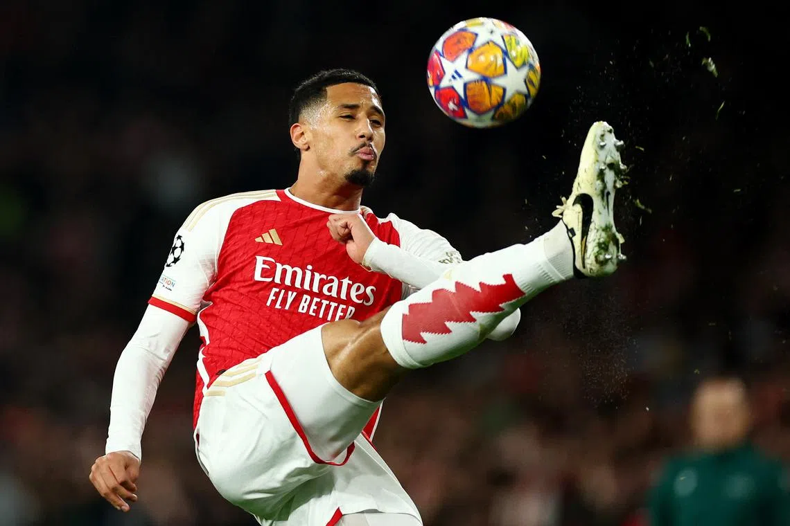 FILE PHOTO: Soccer Football - Champions League - Round of 16 - Second Leg - Arsenal v FC Porto - Emirates Stadium, London, Britain - March 12, 2024 Arsenal's William Saliba in action REUTERS/Andrew Boyers/File Photo