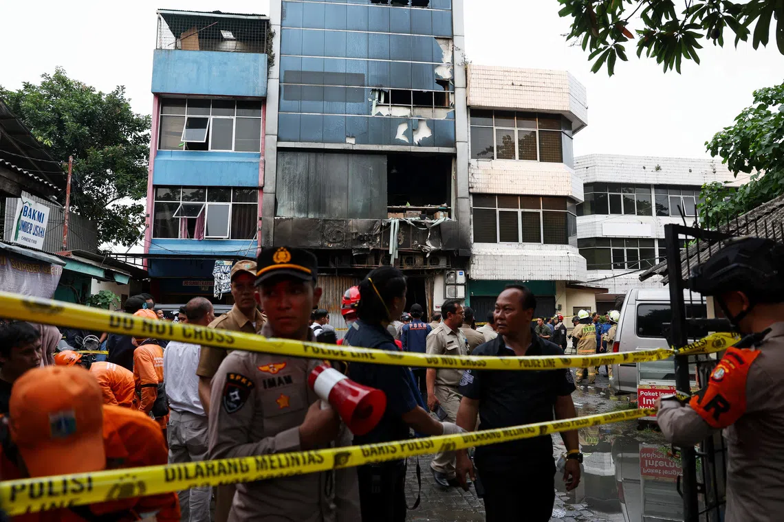 Fire rips through seven-storey building in Jakarta, killing 22 people