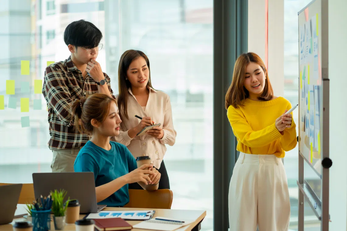Shopee staff discussing during a meeting 