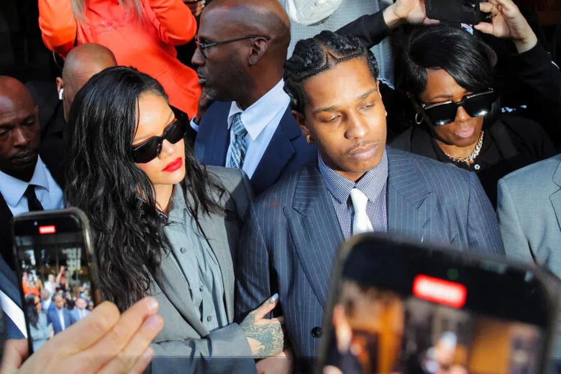 Rakim Mayers (right), also known as A$AP Rocky, exits the court with his partner, pop star Rihanna (left), after he was found not guilty of shooting a former collaborator on Feb 18, 2025 in Los Angeles, California.