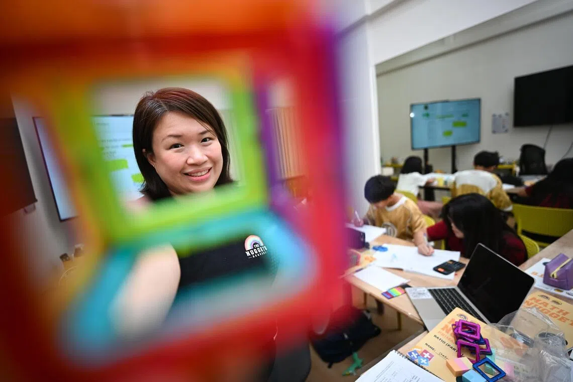 Ms Sandra Lim, head coach and founder of The Nuggets Academy, teaching a class of P6 pupils.