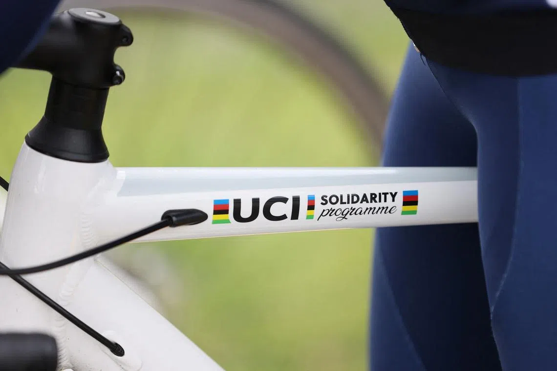FILE PHOTO: A sticker of the Solidarity Programme of the International Cycling Union is pictured on the bike of an Afghan refugee at the World Cycling Center in Aigle, Switzerland, June 3, 2022. REUTERS/Denis Balibouse/File Photo