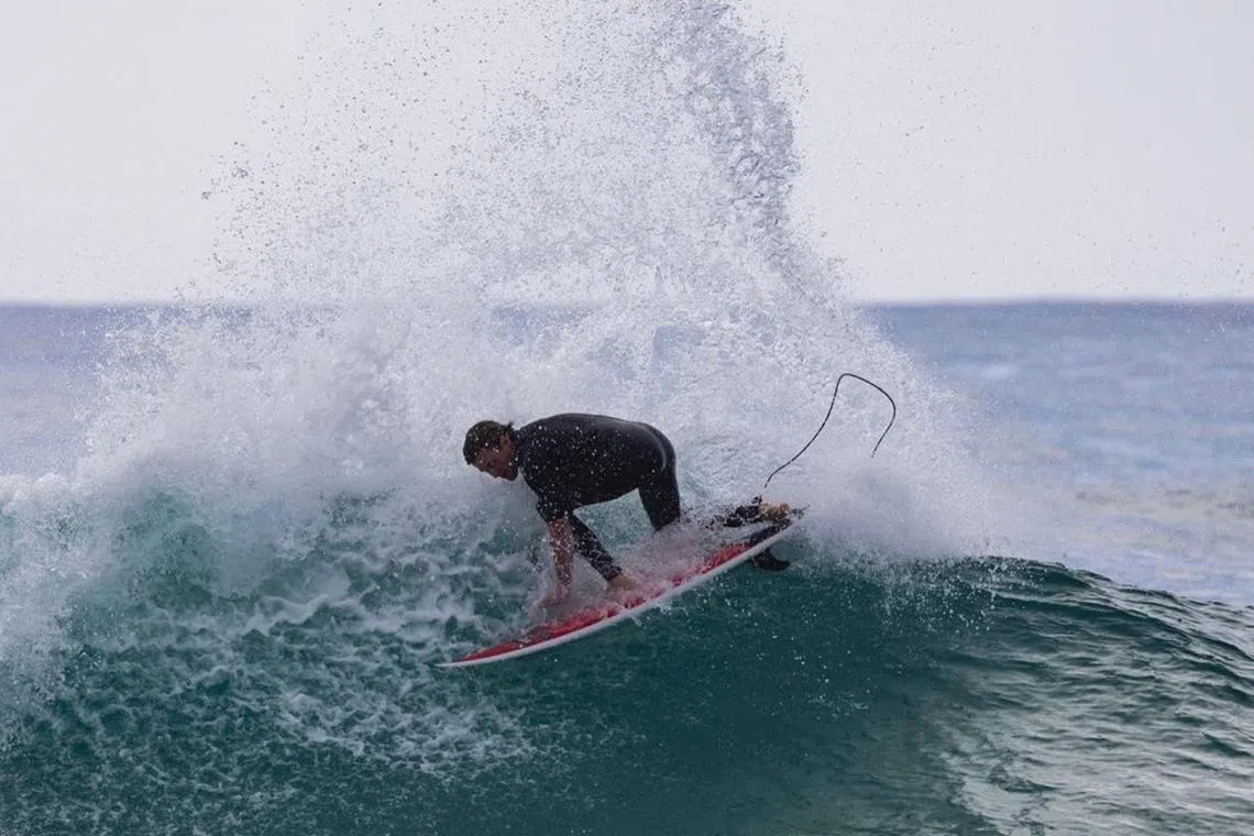  Mr Kai McKenzie was just returning to the waves after breaking his back in 2023.