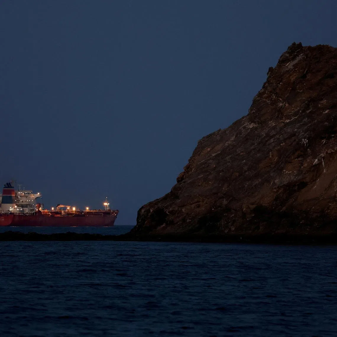 FILE PHOTO: The Callisto tanker sits anchored as the traffic is down in the Strait of Hormuz, amid the U.S.-Israeli conflict with Iran, in Muscat, Oman, March 10, 2026. REUTERS/Benoit Tessier/File Photo