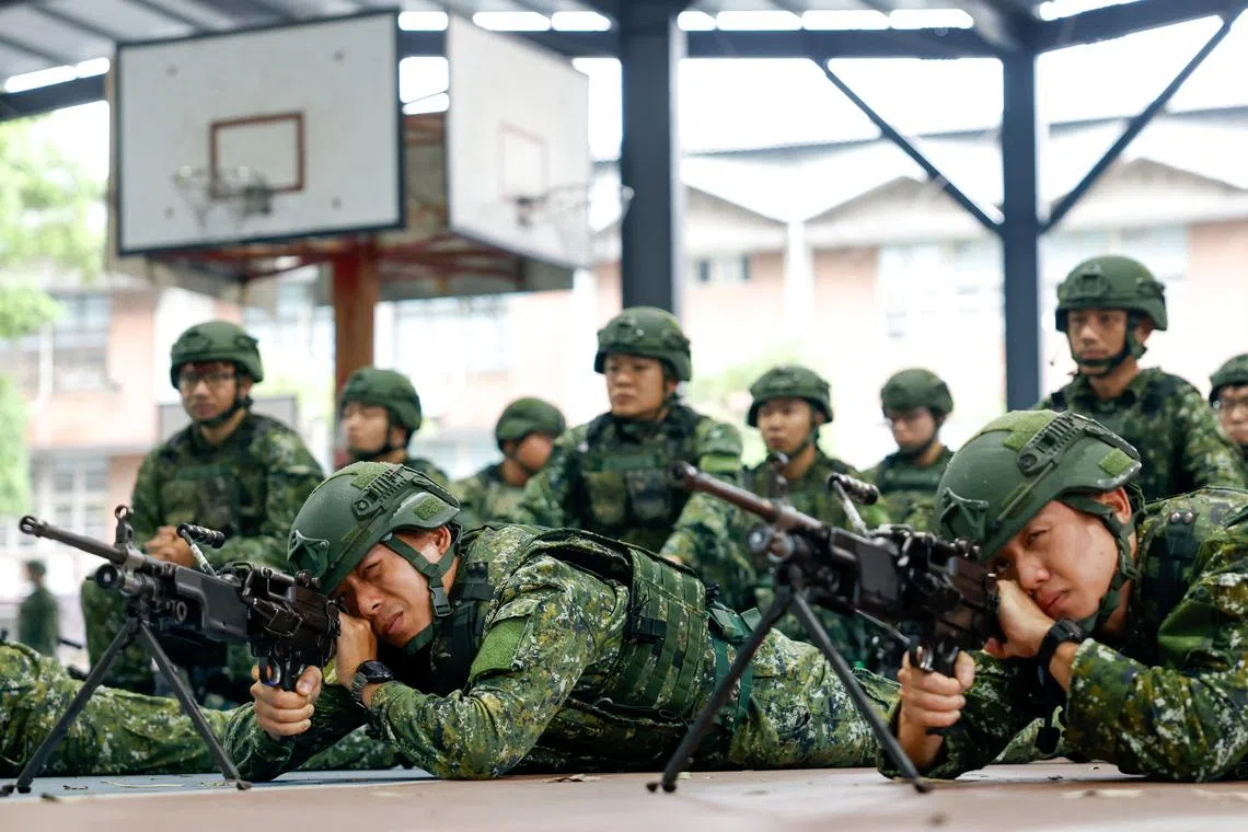 Reservists receive training during the annual Han Kuang military exercises in Taoyuan, Taiwan July 9, 2025. REUTERS/Ann Wang