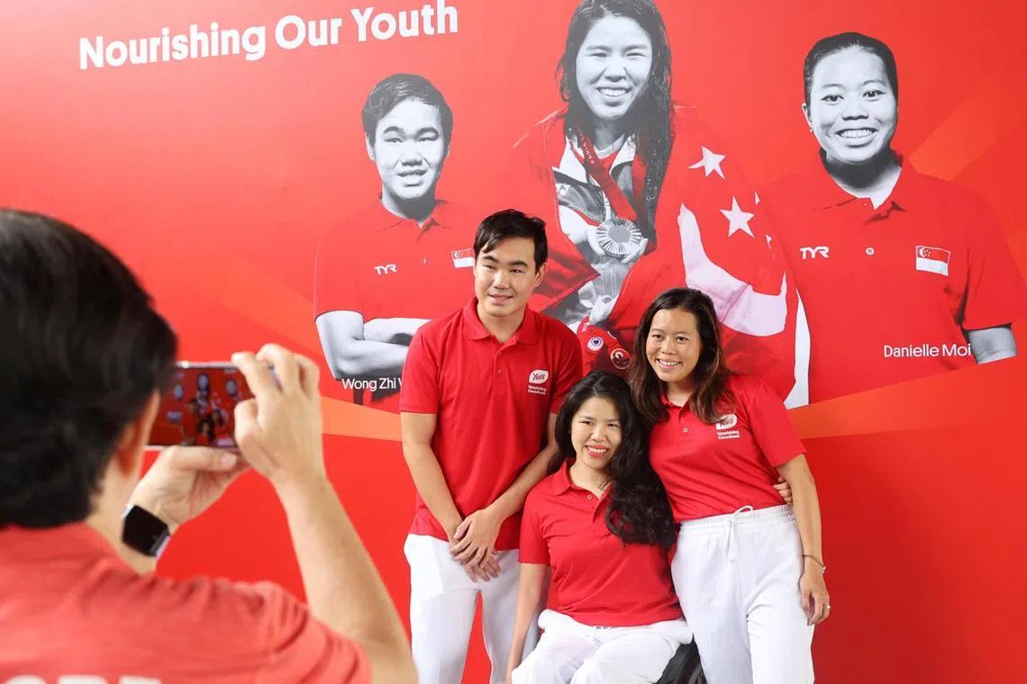 (From left) Yeo's ambassadors and Singapore para-swimmers Wong Zhi Wei, Yip Pin Xiu and Danielle Moi.