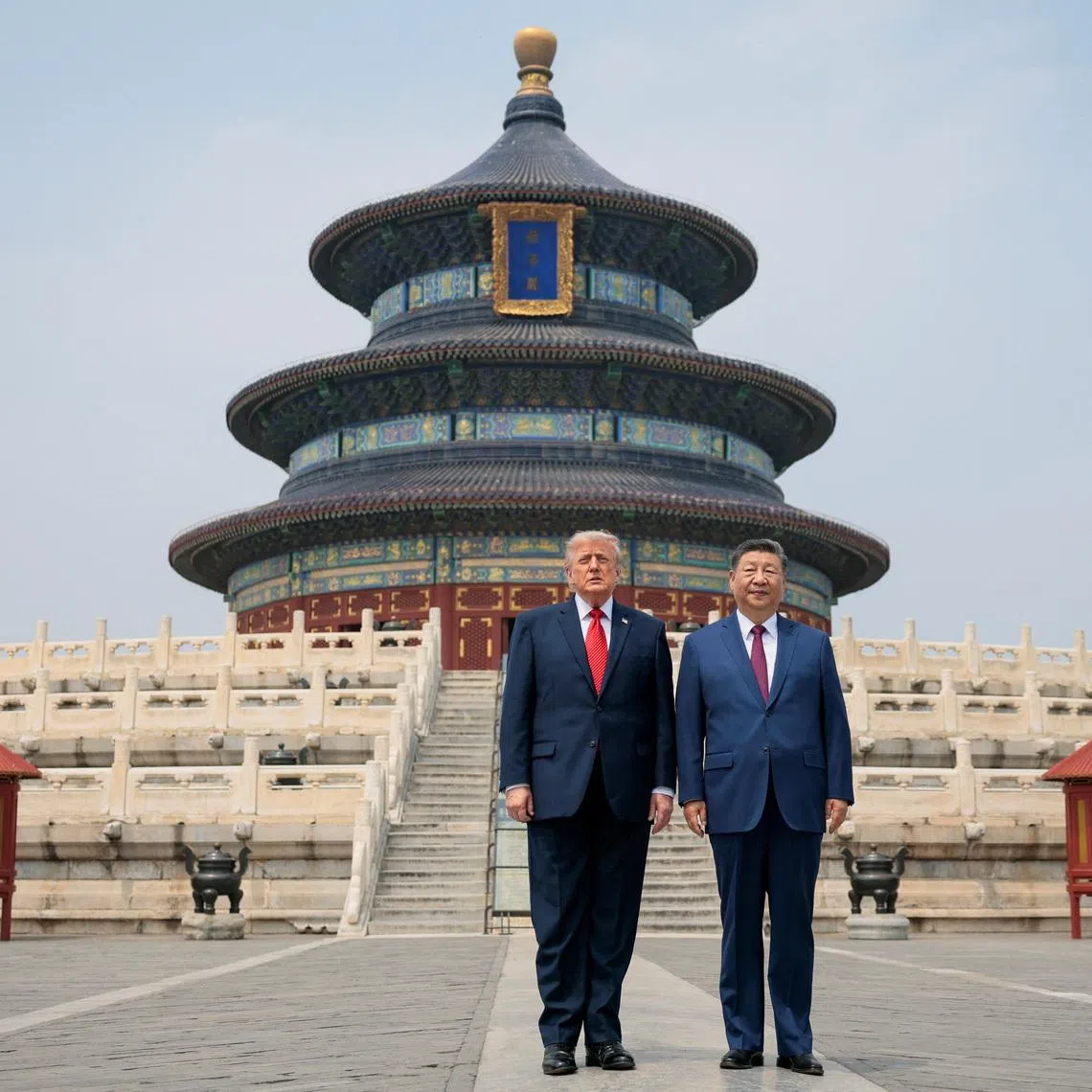 US President Donald Trump and Chinese President Xi Jinping standing together as they tour the Temple of Heaven in Beijing, China, on May 14.